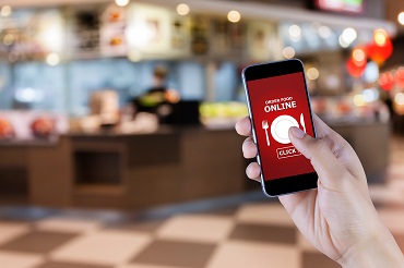 Phone with image of Order Online Food message