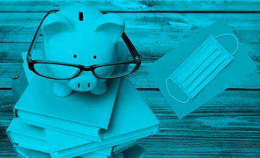 piggy bank with glasses on books and a mask on the side