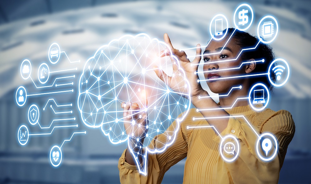 African woman with drawing of a brain with dots and icons