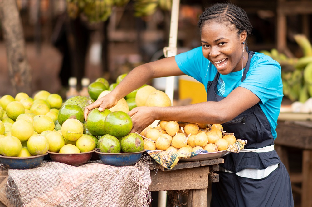 African woman selling produce in a market