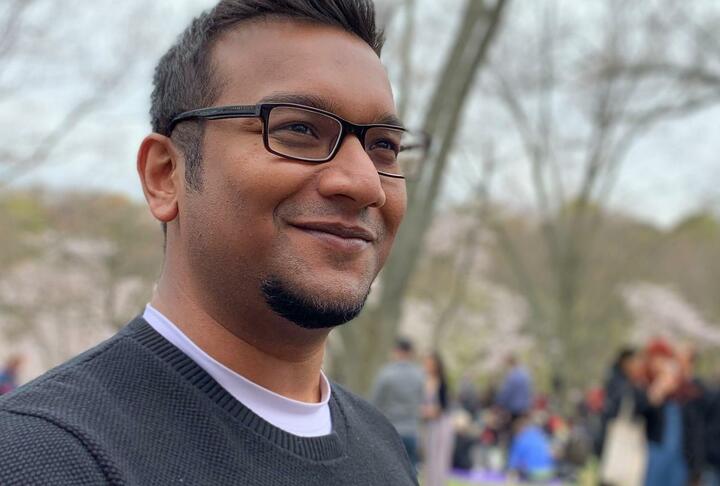 Young man with eye glasses looking to the right