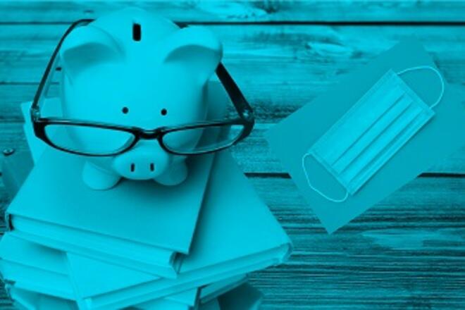 piggy bank with glasses on books and a mask on the side